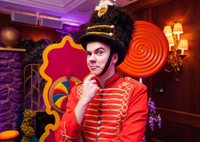 Candy Kingdom guard character at a themed children's Christmas party