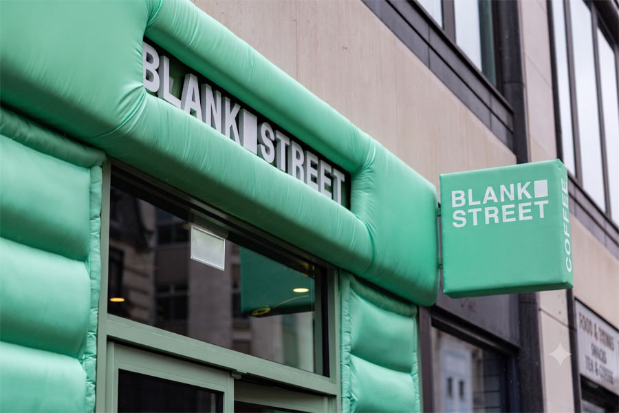 Branded promotional display within the Blank Street Coffee activation featuring custom-built experiential marketing fixtures.