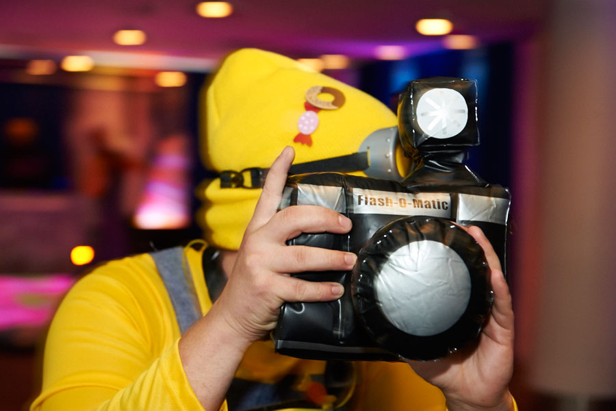 Themed walkabout character entertaining guests during a corporate film screening and private cinema event.