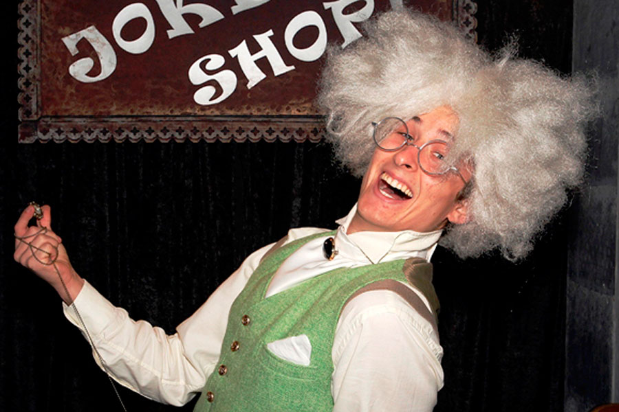 Themed walkabout entertainer welcoming guests to a corporate film screening with immersive character entertainment.